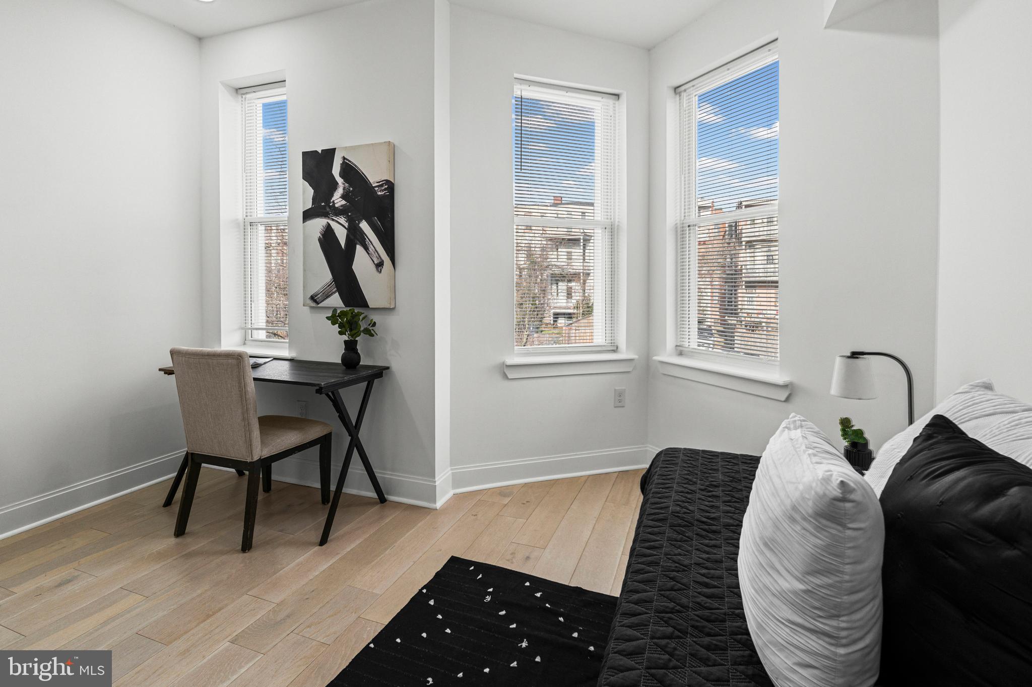 2321 Madison Avenue Baltimore, MD 21217 - Photo 28 of 55 a bed room with a bed and a window