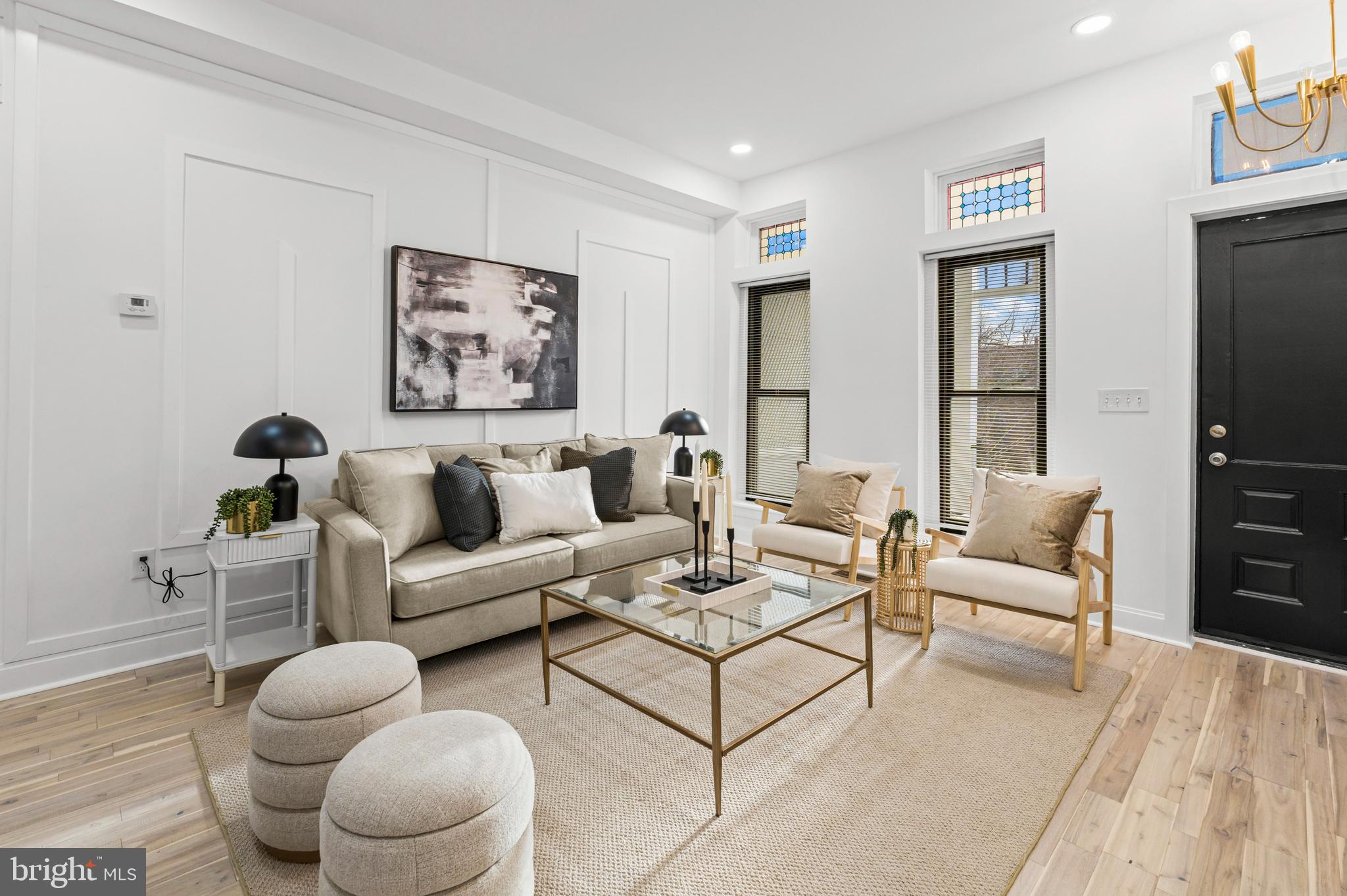 2321 Madison Avenue Baltimore, MD 21217 - Photo 3 of 55 a living room with furniture and a large window