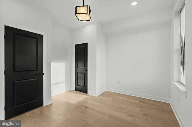 a view of a hallway with stairs