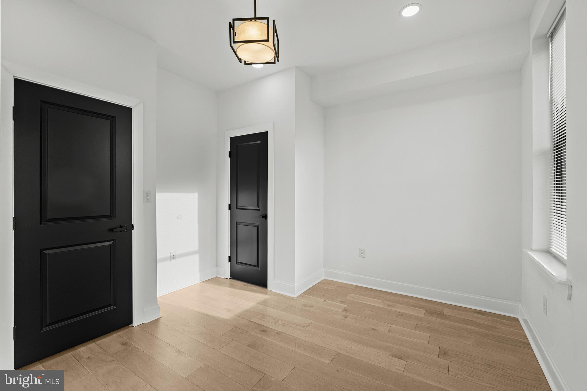 2321 Madison Avenue Baltimore, MD 21217 - Photo 32 of 55 an empty room with windows