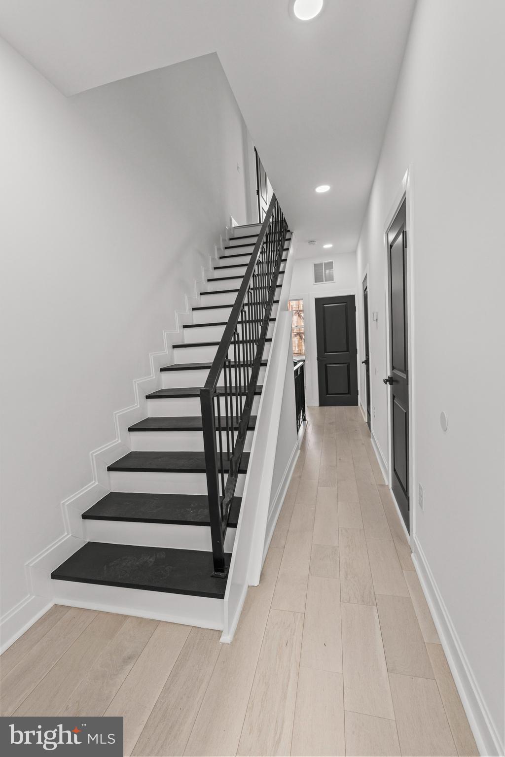 2321 Madison Avenue Baltimore, MD 21217 - Photo 34 of 55 a view of a hallway with stairs