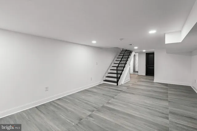 a view of a balcony with wooden floor