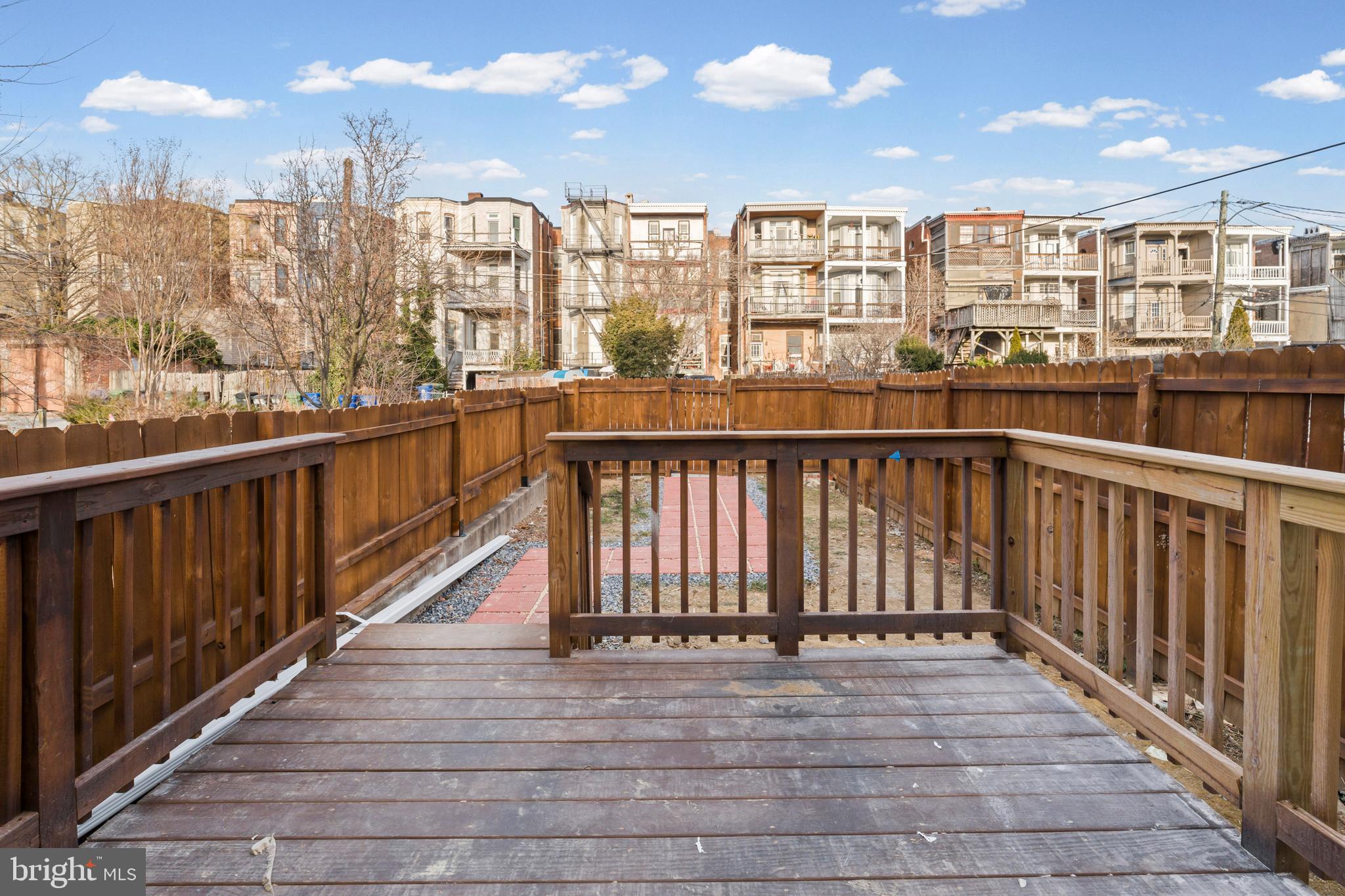 2321 Madison Avenue Baltimore, MD 21217 - Photo 47 of 55 a view of a balcony with wooden floor