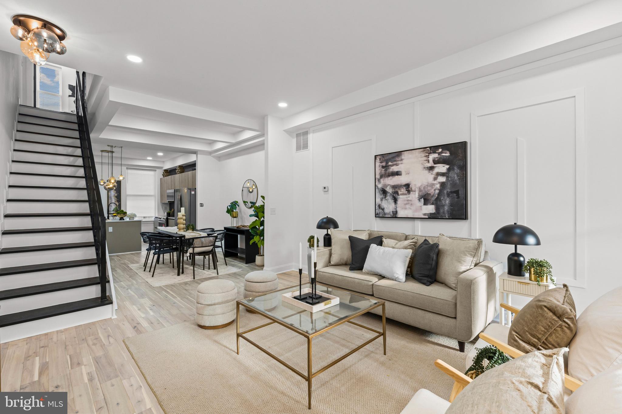 2321 Madison Avenue Baltimore, MD 21217 - Photo 6 of 55 a living room with furniture and wooden floor
