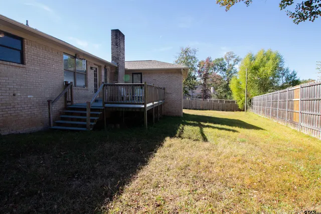 a house view with a garden space