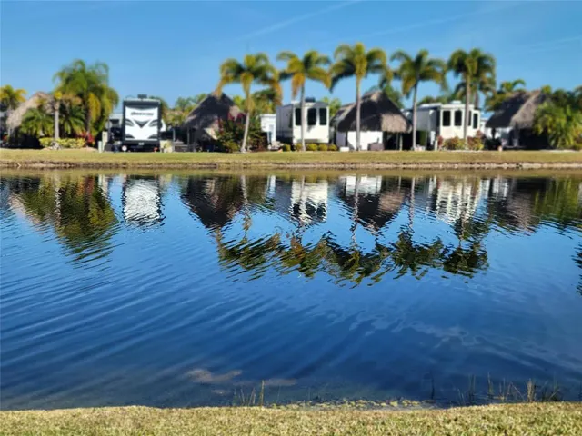a view of a swimming pool with a lake