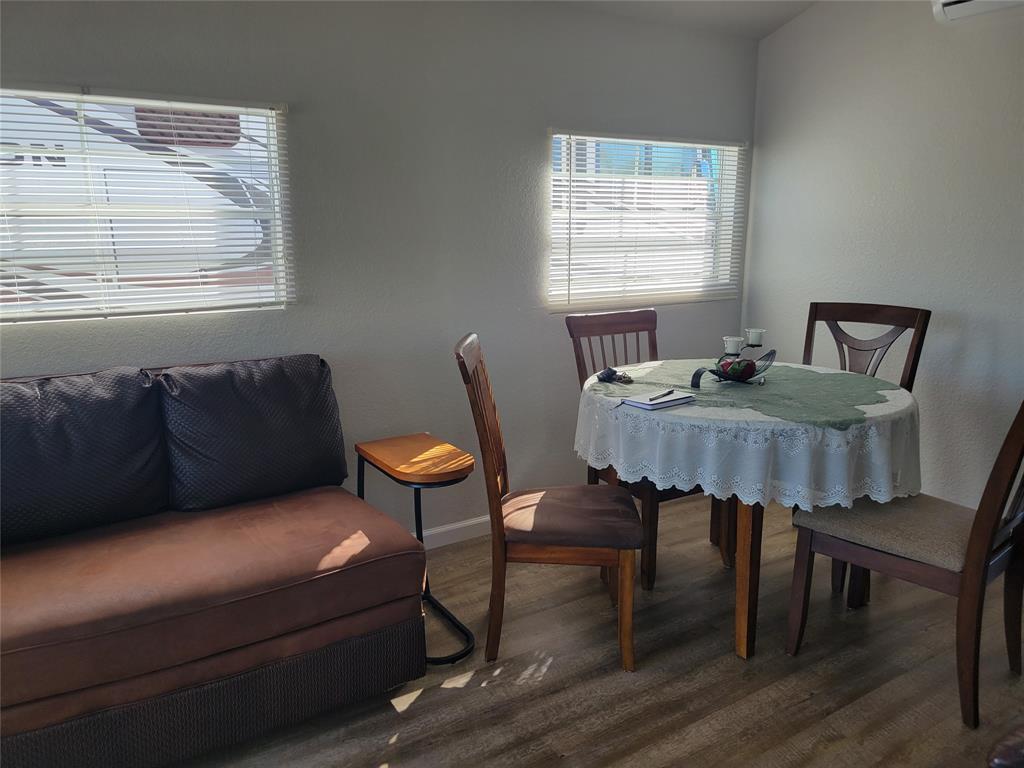 551 Southwest 42nd Cove Okeechobee, FL 34974 - Photo 18 of 25 a living room with furniture and a table
