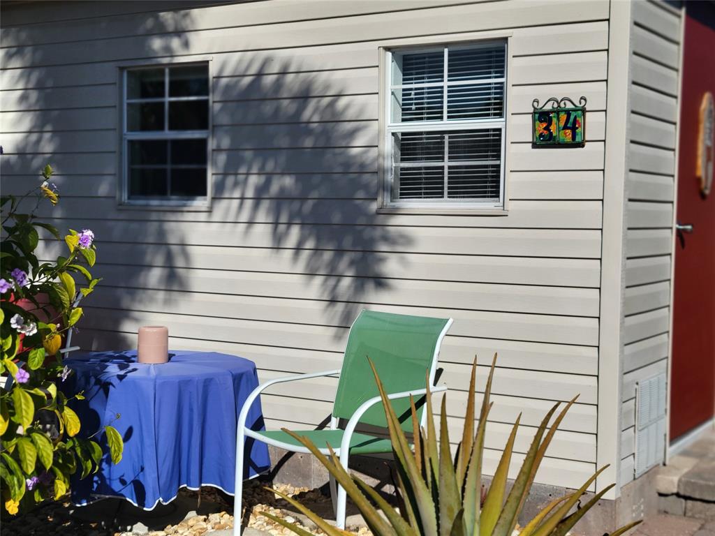 551 Southwest 42nd Cove Okeechobee, FL 34974 - Photo 8 of 25 a view of front door and wooden door