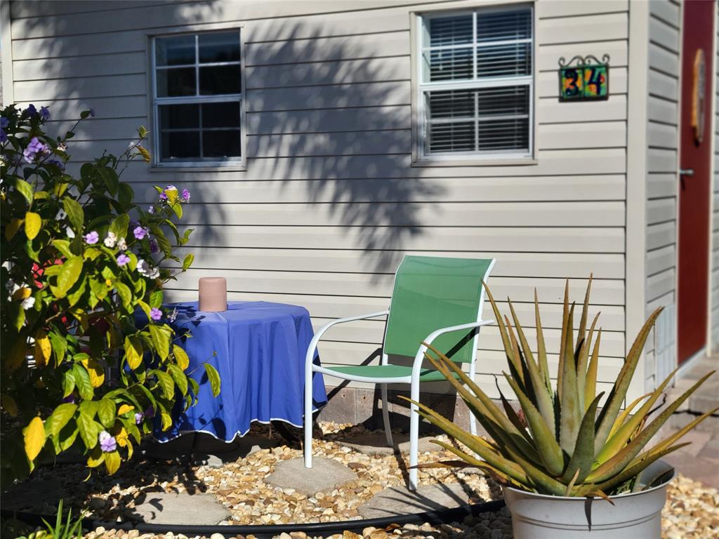 551 Southwest 42nd Cove Okeechobee, FL 34974 - Photo 9 of 25 a front view of a house with a yard