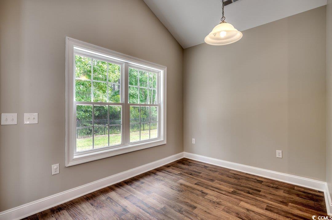 4076 Ridgewood Drive Conway, SC 29526 - Photo 11 of 32 Unfurnished room with vaulted ceiling and dark har