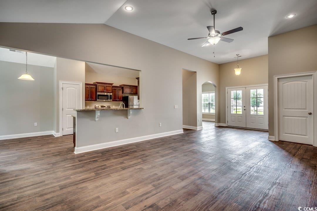4076 Ridgewood Drive Conway, SC 29526 - Photo 13 of 32 Unfurnished living room with dark hardwood / wood-