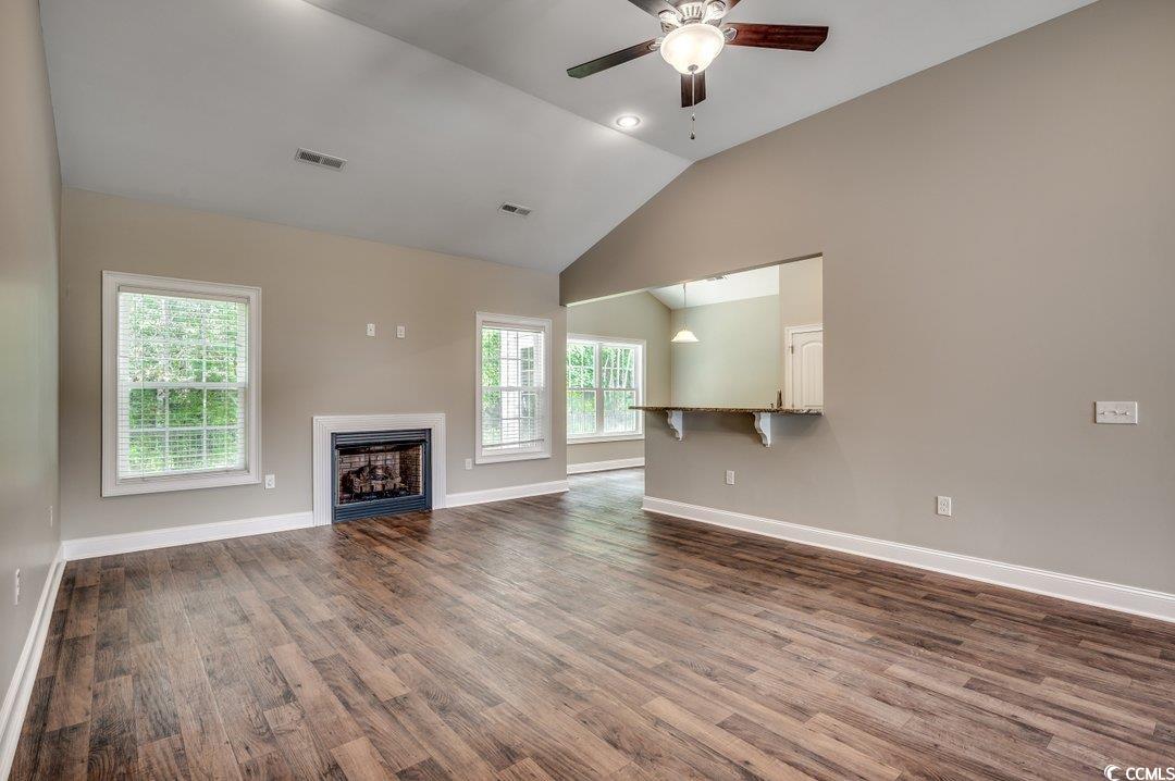 4076 Ridgewood Drive Conway, SC 29526 - Photo 14 of 32 Unfurnished living room featuring lofted ceiling,