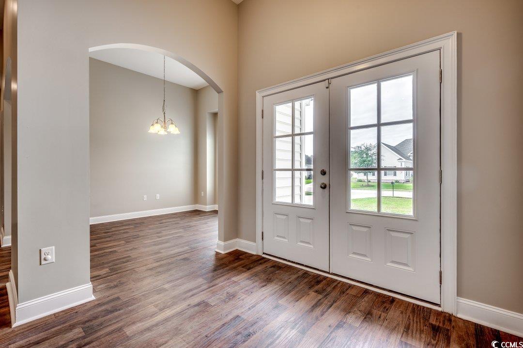 4076 Ridgewood Drive Conway, SC 29526 - Photo 2 of 32 Doorway featuring wood-type flooring, an inviting