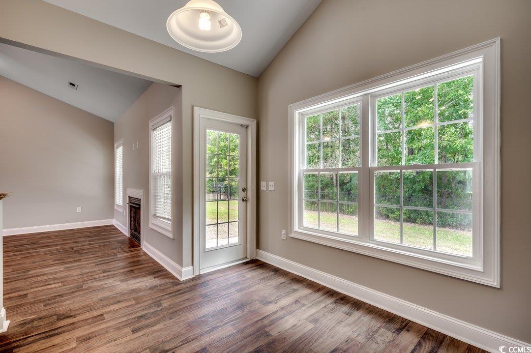4076 Ridgewood Drive Conway, SC 29526 - Photo 10 of 32 Doorway to outside with vaulted ceiling and dark w