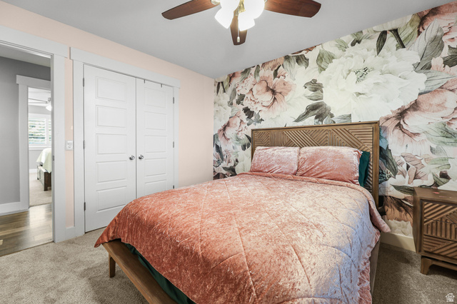 2056 West Ridgeline Road Stockton, UT 84071 - Photo 27 of 50 Accent wall featuring a floral pattern