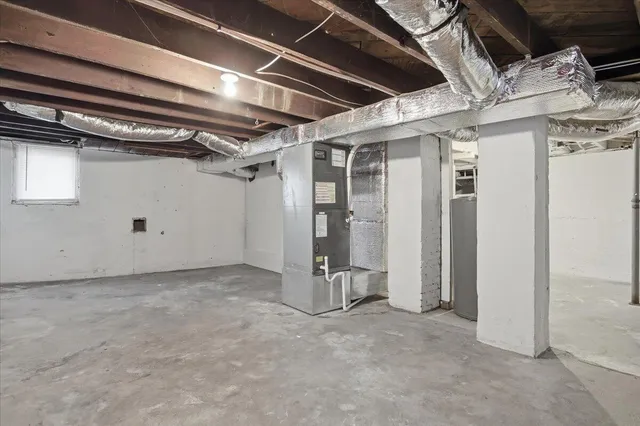 a view of a room with wooden walls