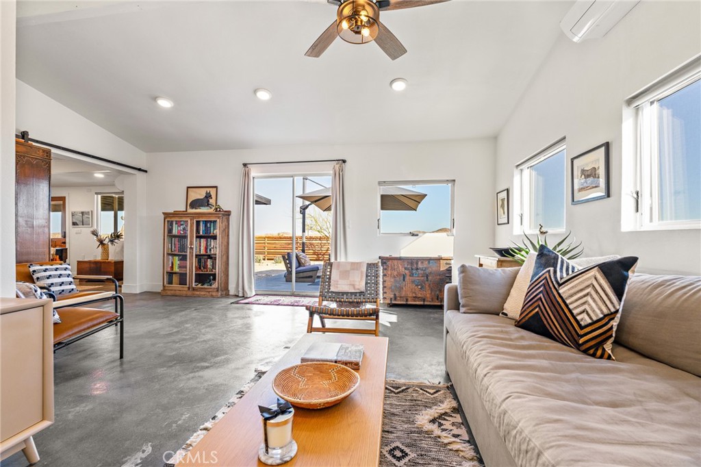 4212 Oneill Road Joshua Tree, CA 92252 - Photo 18 of 60 a living room with furniture and a table