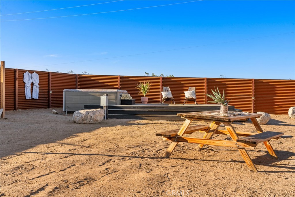 4212 Oneill Road Joshua Tree, CA 92252 - Photo 30 of 60 a view of a swimming pool with a lounge chair
