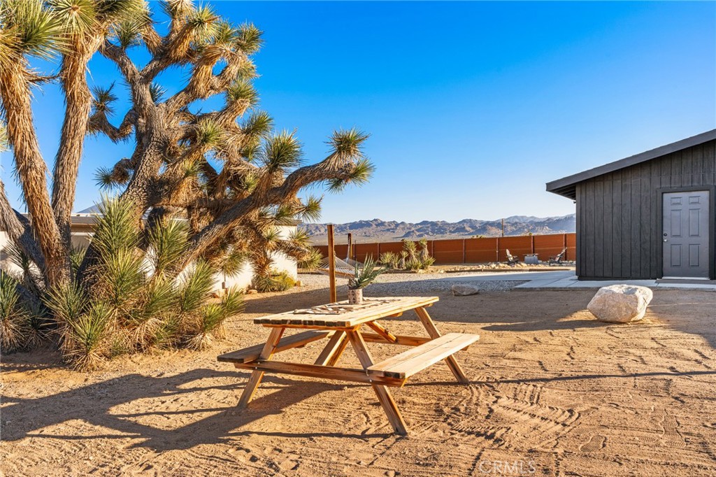 4212 Oneill Road Joshua Tree, CA 92252 - Photo 32 of 60 a view of swimming pool from a lounge chair