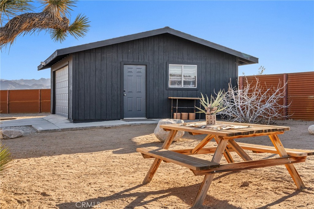 4212 Oneill Road Joshua Tree, CA 92252 - Photo 33 of 60 a house view with a backyard space