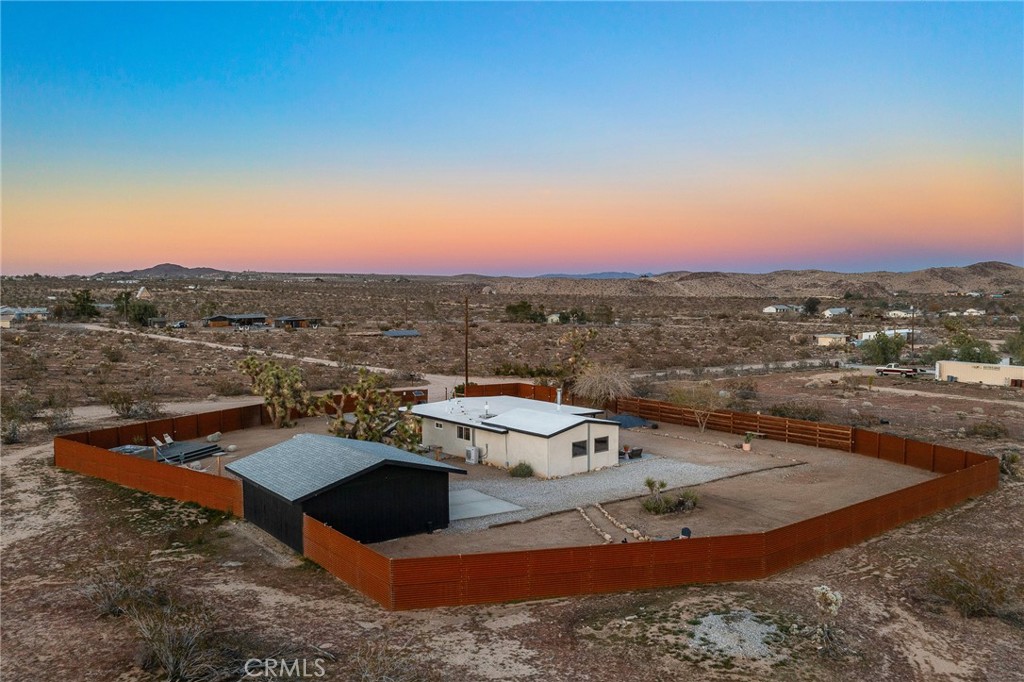 4212 Oneill Road Joshua Tree, CA 92252 - Photo 49 of 60 an aerial view of a house with a yard