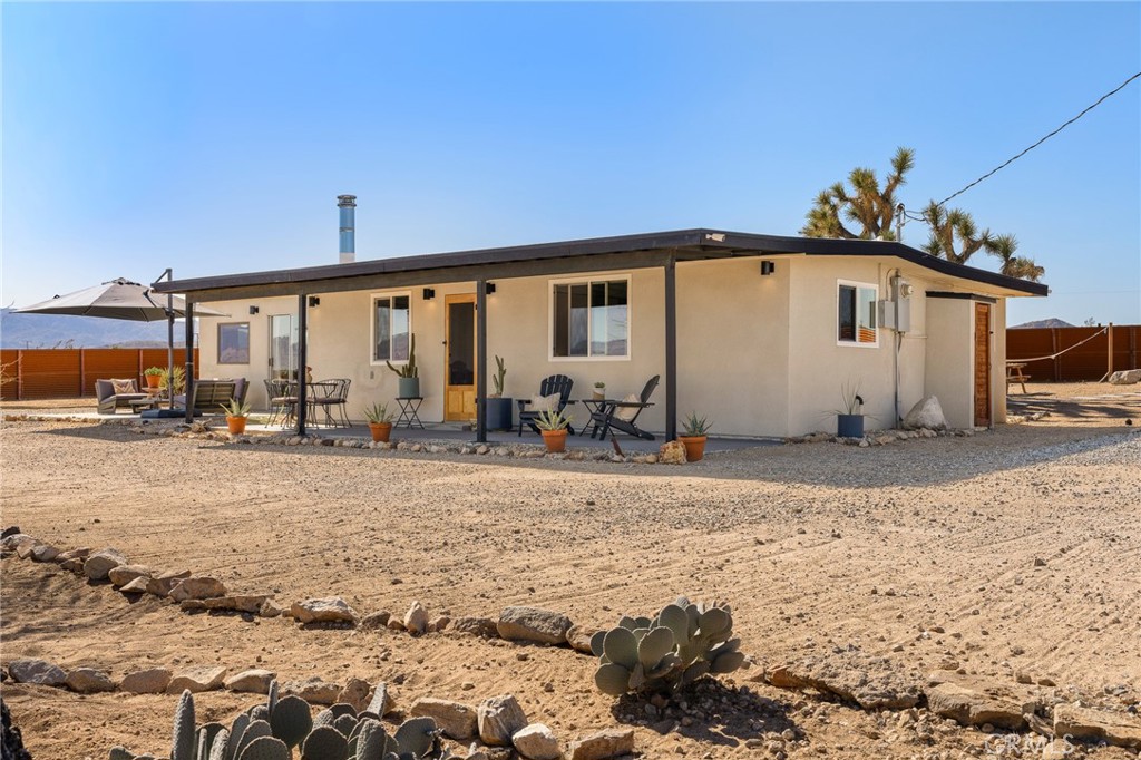 4212 Oneill Road Joshua Tree, CA 92252 - Photo 8 of 60 a view of a house with backyard