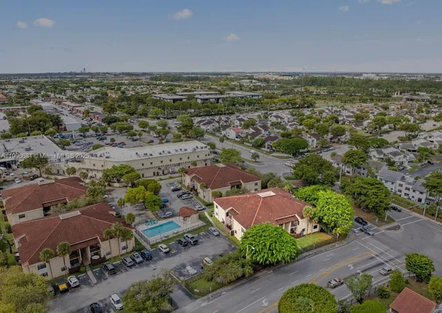 an aerial view of a houses with a outdoor space