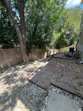 5006 Baker Street, Unit B Austin, TX 78721 - Photo 15 of 16 a view of a yard with trees