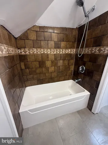 a bathroom with a bathtub