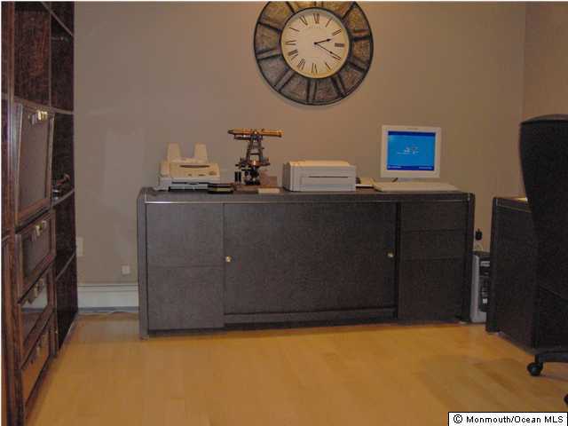 120 Hunt Road Freehold, NJ 07728 - Photo 3 of 3 a room with furniture and fan