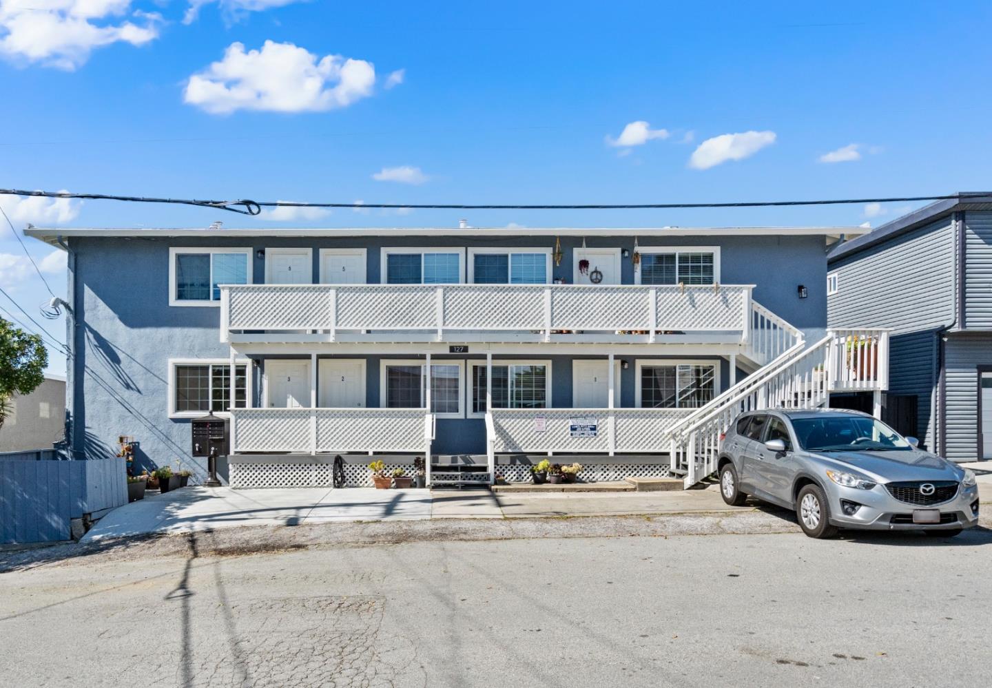 127 Hilton Way Pacifica, CA 94044 - Photo 3 of 18 a car parked in front of a building