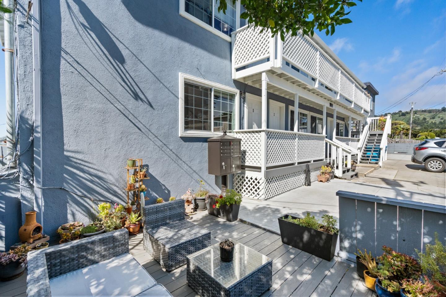 127 Hilton Way Pacifica, CA 94044 - Photo 4 of 18 a view of a house with a patio