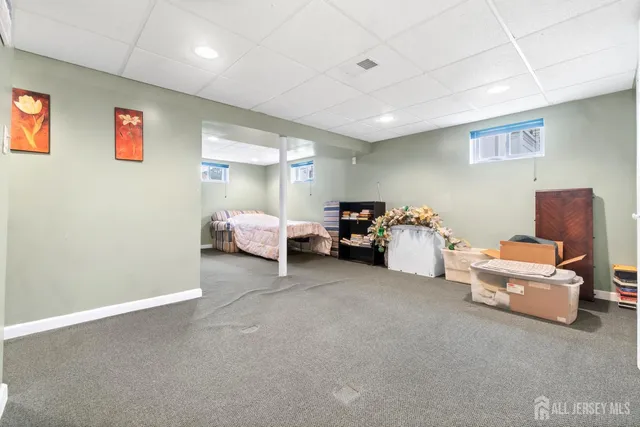 an aerial view of a house with yard swimming pool and outdoor seating