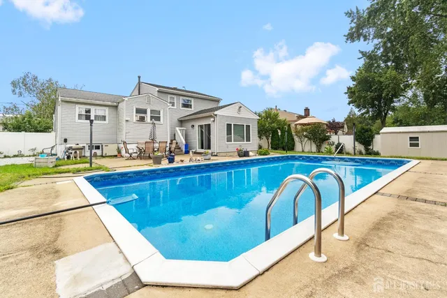 a swimming pool with outdoor view