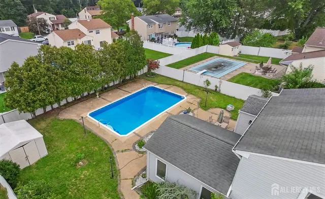 an aerial view of a house with a garden