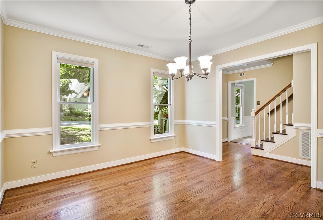 14000 Turtle Hill Road Midlothian, VA 23112 - Photo 17 of 37 a view of a livingroom with wooden floor stairs and a window