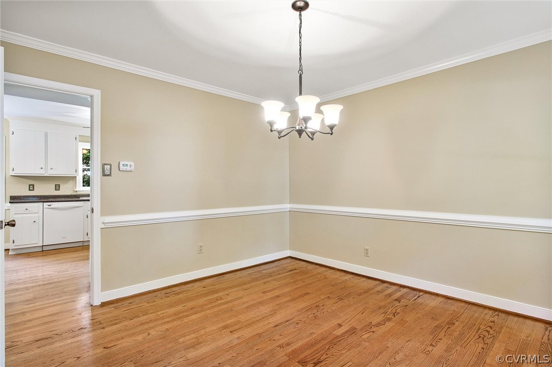 14000 Turtle Hill Road Midlothian, VA 23112 - Photo 18 of 37 a view of a room with wooden floor and kitchen
