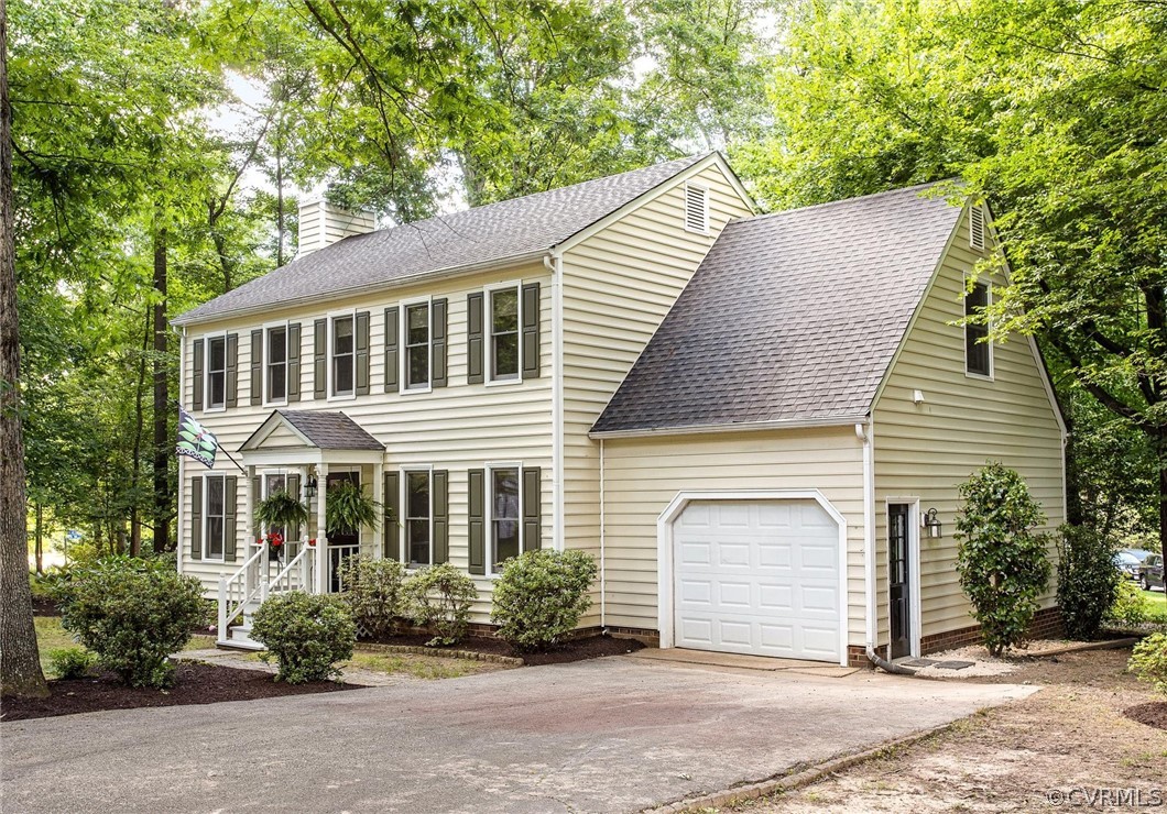 14000 Turtle Hill Road Midlothian, VA 23112 - Photo 2 of 37 a front view of a house with garden