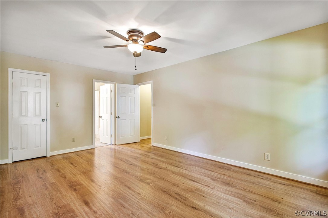 14000 Turtle Hill Road Midlothian, VA 23112 - Photo 21 of 37 a view of an empty room with wooden floor