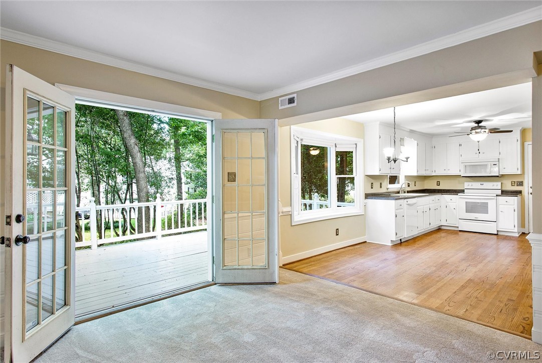 14000 Turtle Hill Road Midlothian, VA 23112 - Photo 10 of 37 a view of a kitchen with large windows