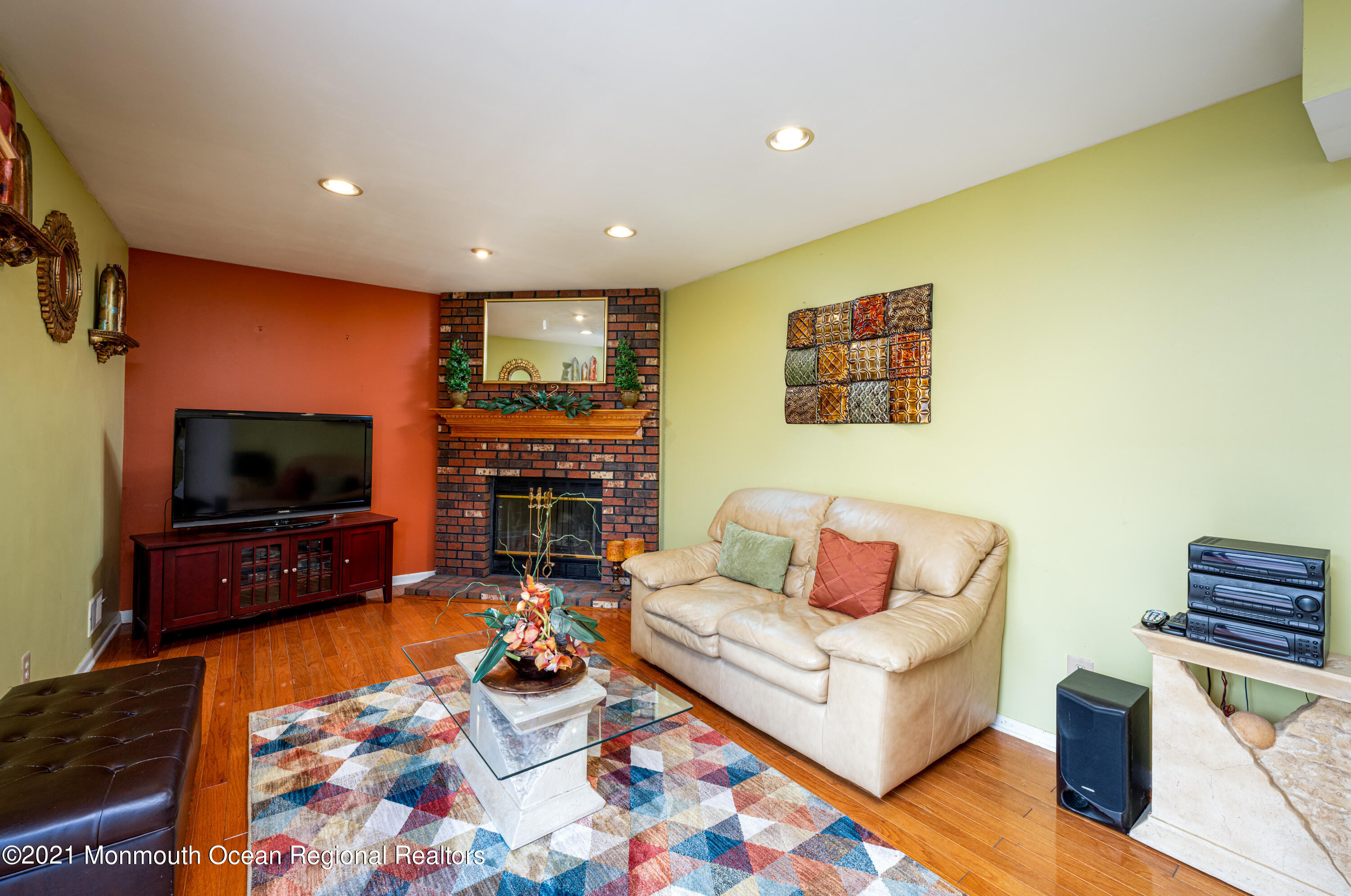 36 Kiwi Loop Howell, NJ 07731 - Photo 14 of 33 a living room with furniture and a flat screen tv