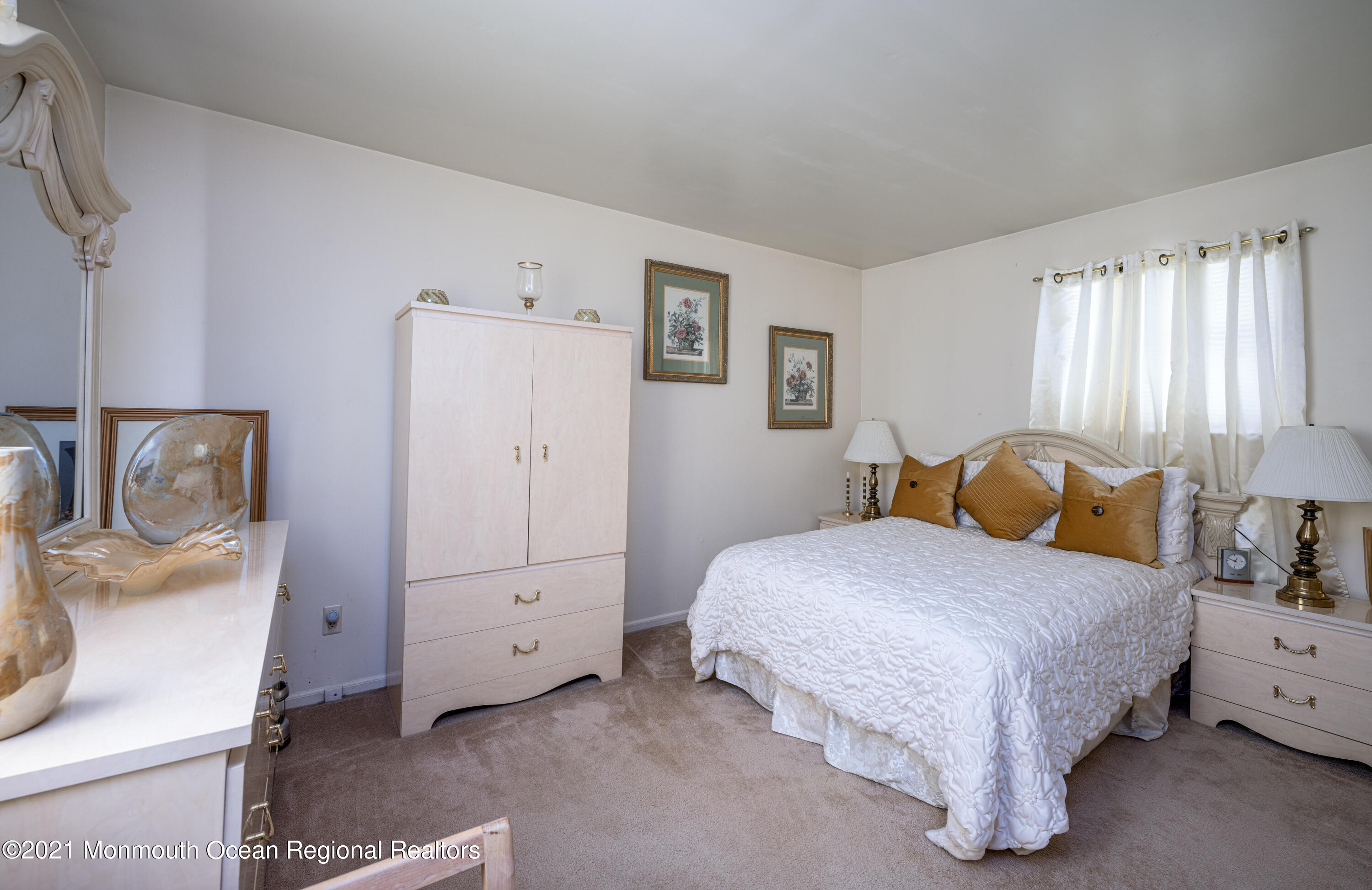 36 Kiwi Loop Howell, NJ 07731 - Photo 22 of 33 a bedroom with a bed and window