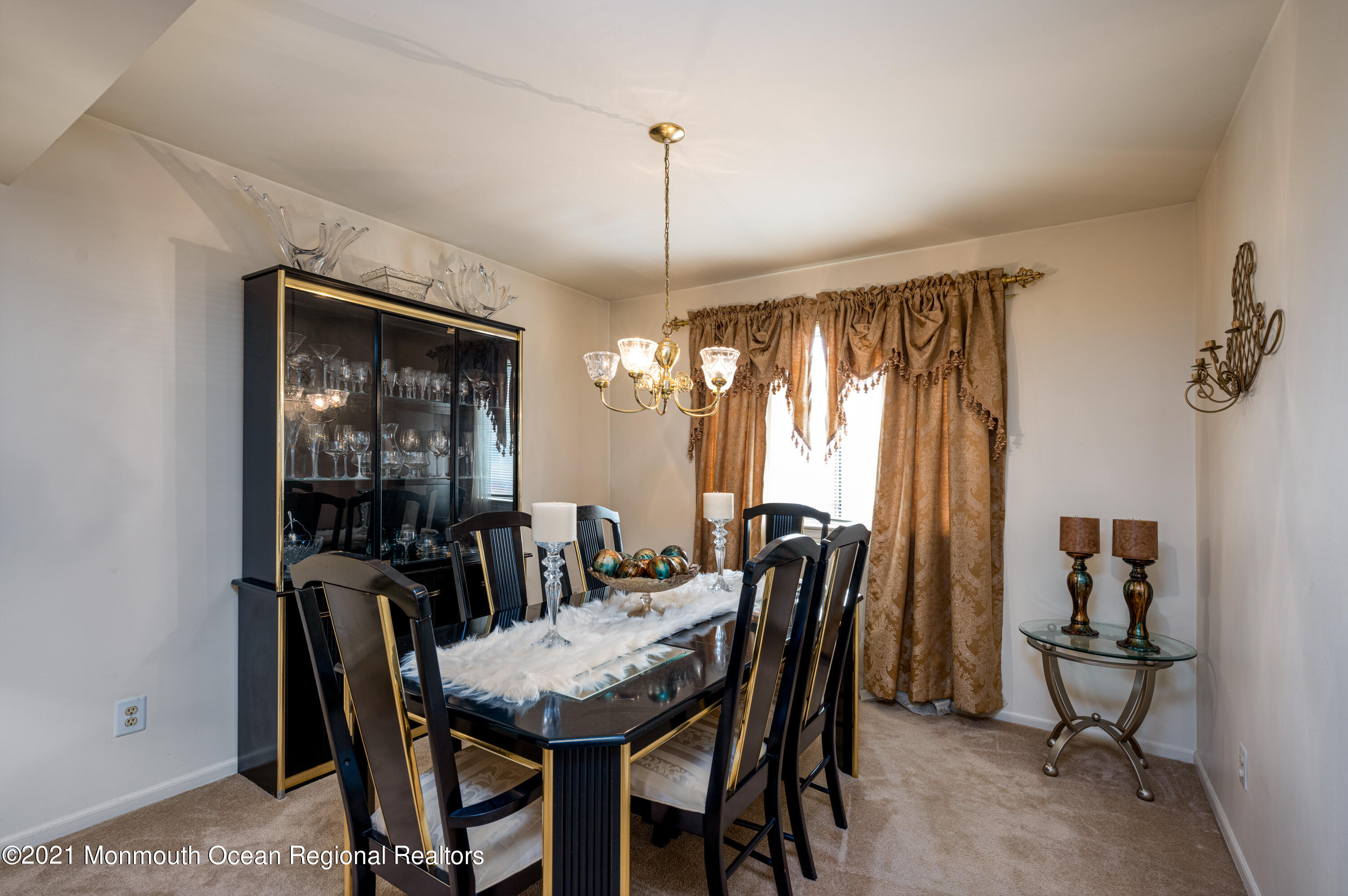 36 Kiwi Loop Howell, NJ 07731 - Photo 8 of 33 a view of a dining room with furniture and window