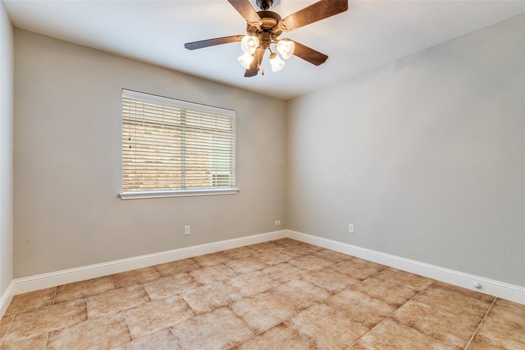 2704 Wind Ridge McKinney, TX 75072 - Photo 22 of 35 3rd bedroom or office featuring ceiling fan and new tile