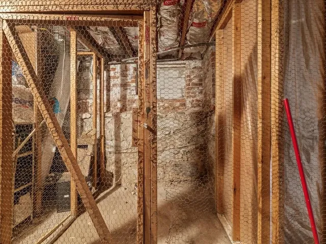 a cars parked in front of a building