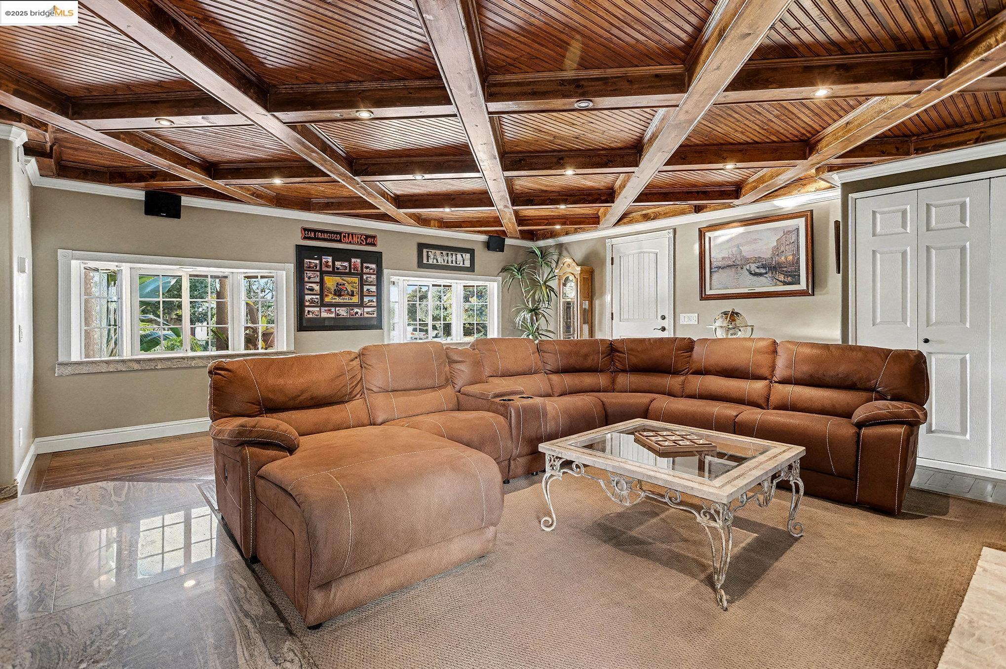 3614 Kay Court Fremont, CA 94538 - Photo 10 of 35 Living room featuring a custom wood ceiling with exposed beams and built in TV