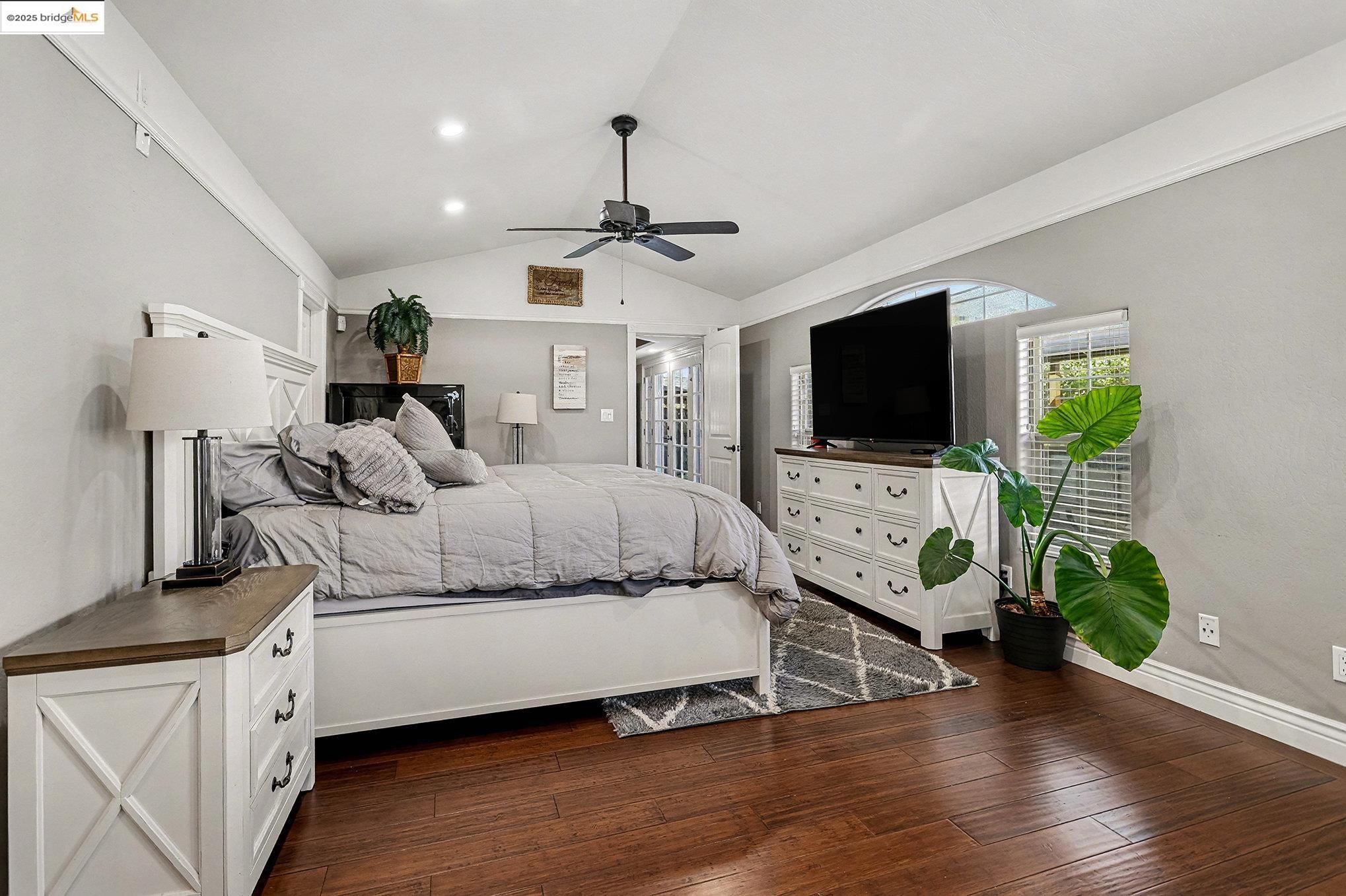 3614 Kay Court Fremont, CA 94538 - Photo 13 of 35 Bedroom featuring dark wood flooring, a ceiling fan, and lofted ceiling