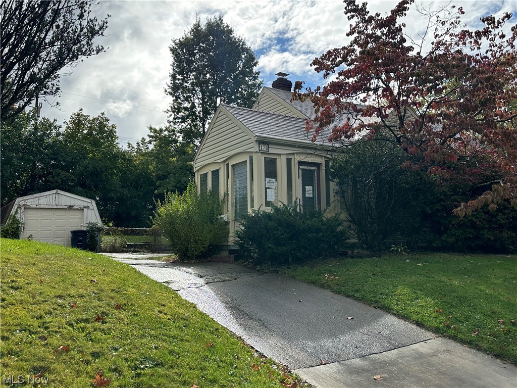 176 East Wilbeth Road Akron, OH 44301 - Photo 1 of 17 View of front of home with a front lawn and a garage