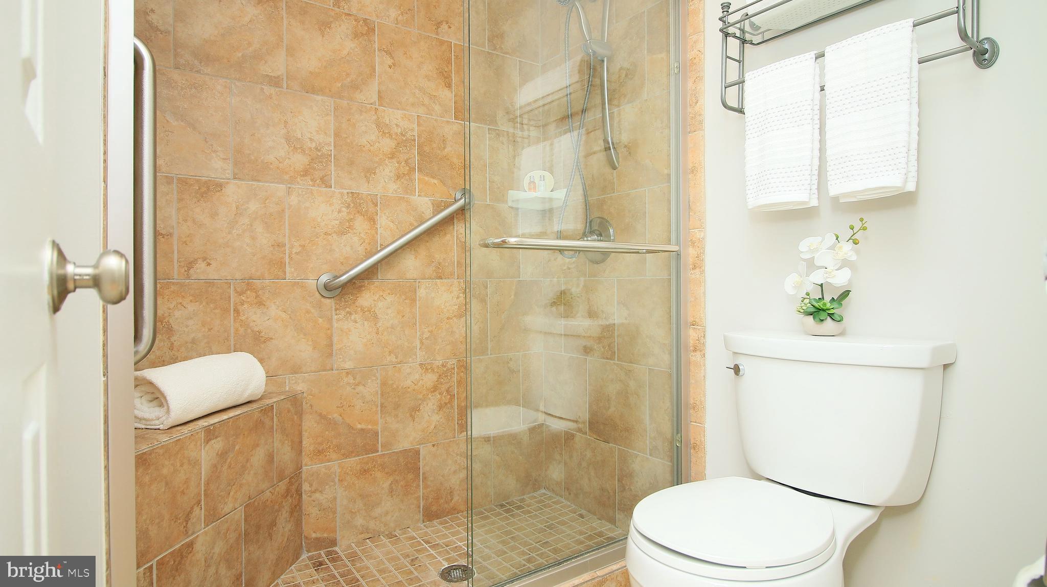 11226 Harbor Court Reston, VA 20191 - Photo 13 of 30 OVERSIZED SHOWER WITH TILE SURROUND & GLASS DOORS