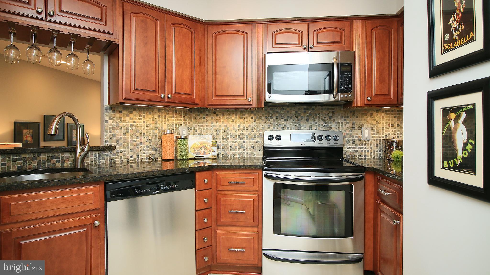 11226 Harbor Court Reston, VA 20191 - Photo 7 of 30 KITCHEN WITH GRANITE & STAINLESS APPLIANCES